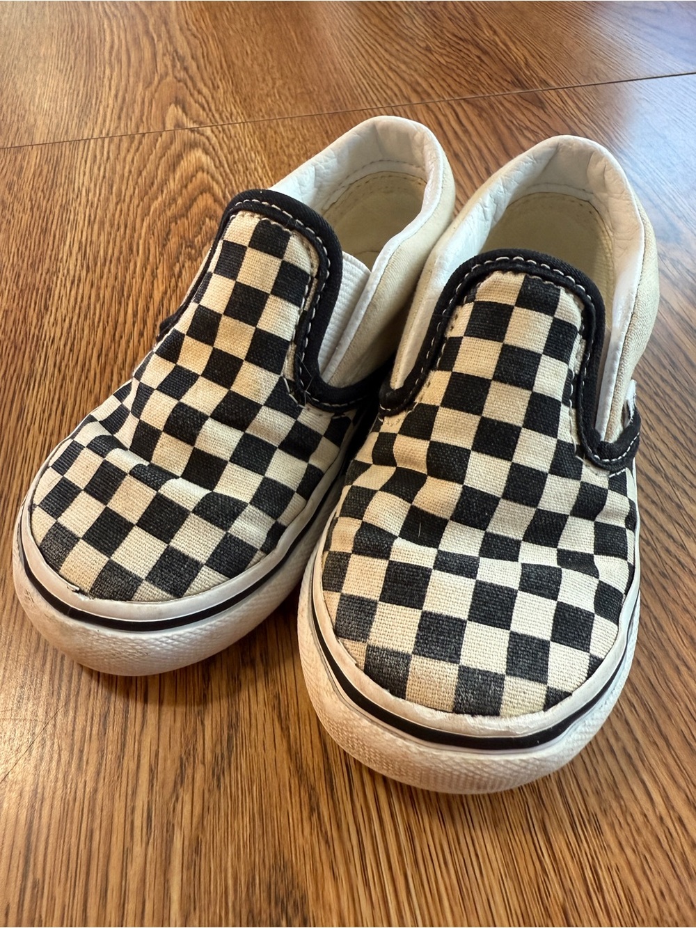 Vans Baby Slip-On Sneakers in Black and White Checkerboard